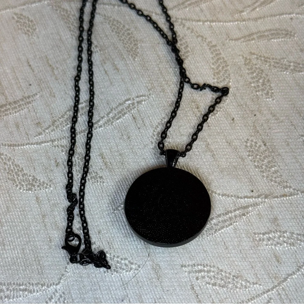 Mechanical or Scientist face and blue‎ butterfly/moth necklace. 24”